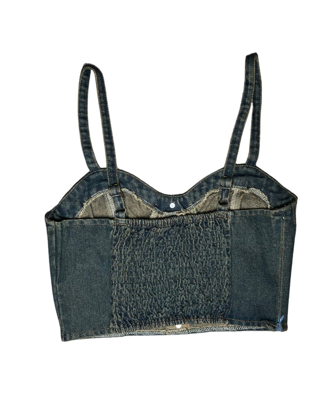 Denim crop top with suspenders on a white background