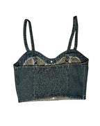Denim crop top with suspenders on a white background